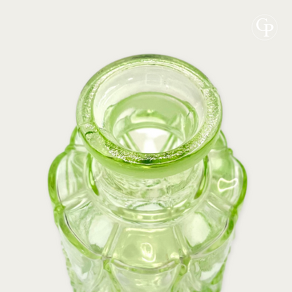 Close-up of the neck and scalloped rim of the rare Val Saint Lambert Valambert n°12 Ouraline uranium glass perfume bottle, showing the thick glass and original ground finish, Art Deco circa 1935. | Gros plan sur le col et le bord festonné du rare flacon Val Saint Lambert Valambert n°12 en verre à l'uranium Ouraline, mettant en valeur l'épaisseur du verre et la finition rodée d'origine, Art Déco vers 1935.